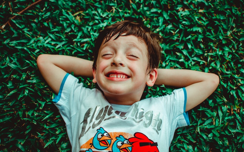 child smiling, brush teeth, Darlene Sand Wall DMD, pediatric dentistry