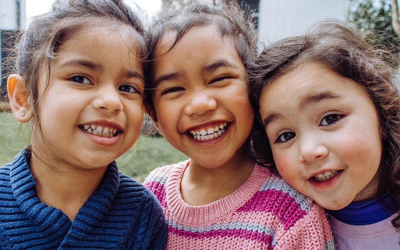 children smiling after dentist visit